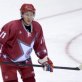 Putin enjoys himself playing ice hockey