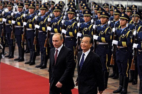 Putin reinforces China alliance