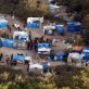 Calais migrant camps demolished by French police